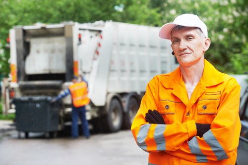 Business professionals managing waste in Stokenewington office